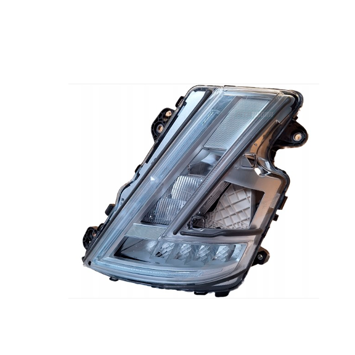 FAROL LED ESQUERDO VOLVO FH5 - 2022.. (24056511-23752672-L0213225)