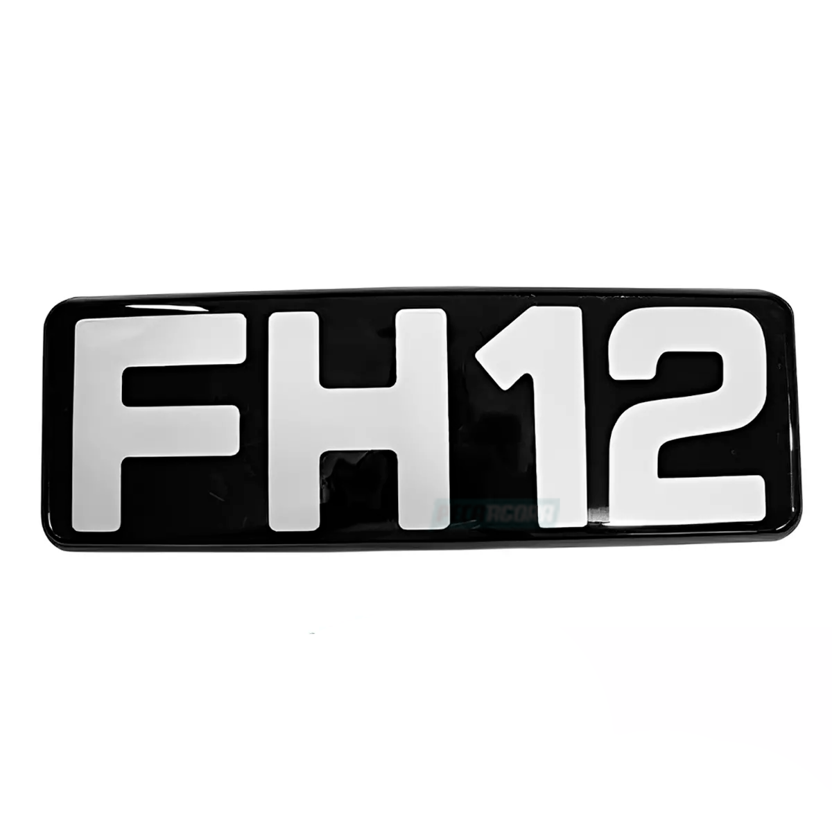 EMBLEMA FH12 GRADE FRONTAL (ANTIGO) VOLVO FH12 ATE 2003 (20360588)